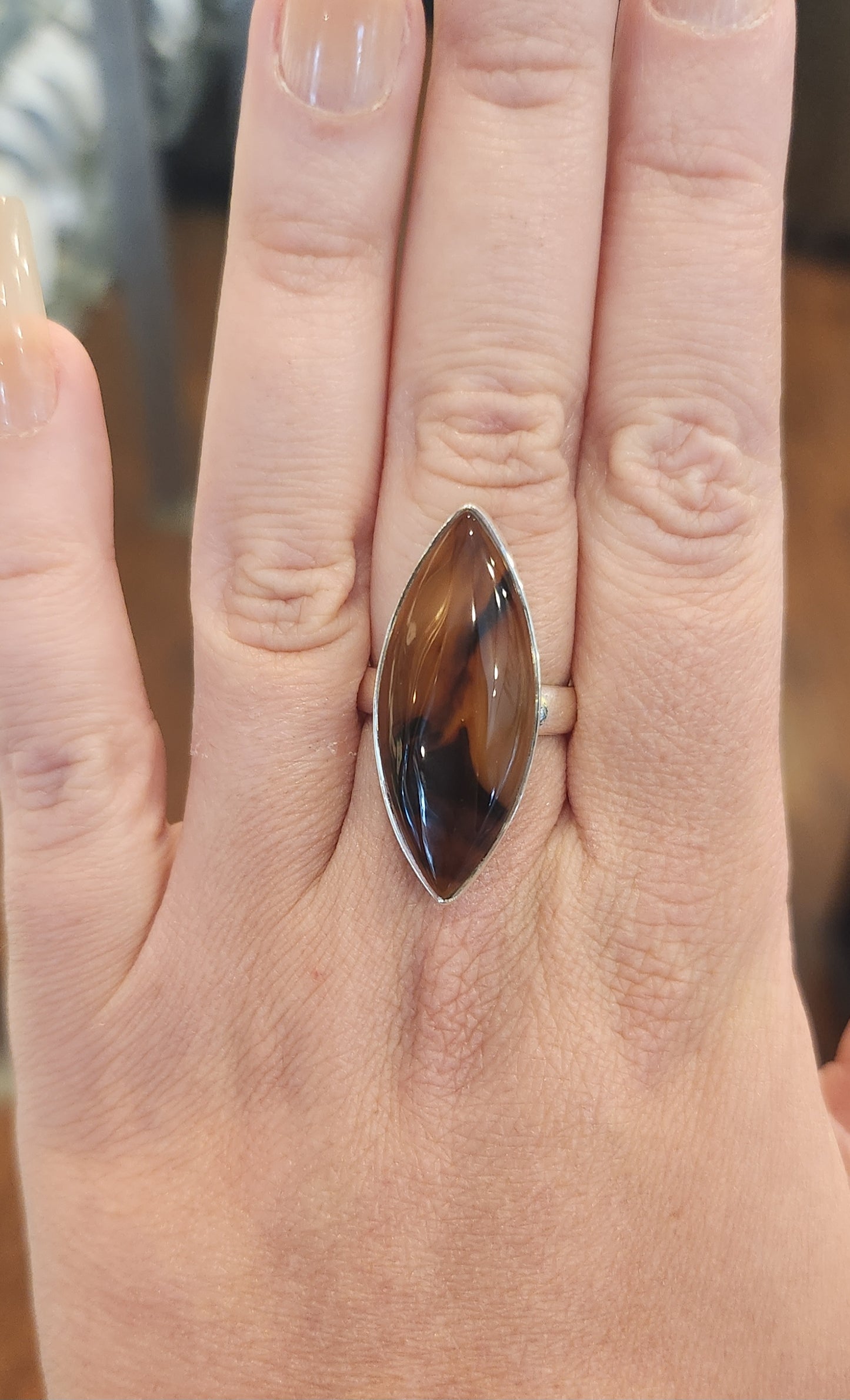 Sterling silver marquis-shaped montana agate ring