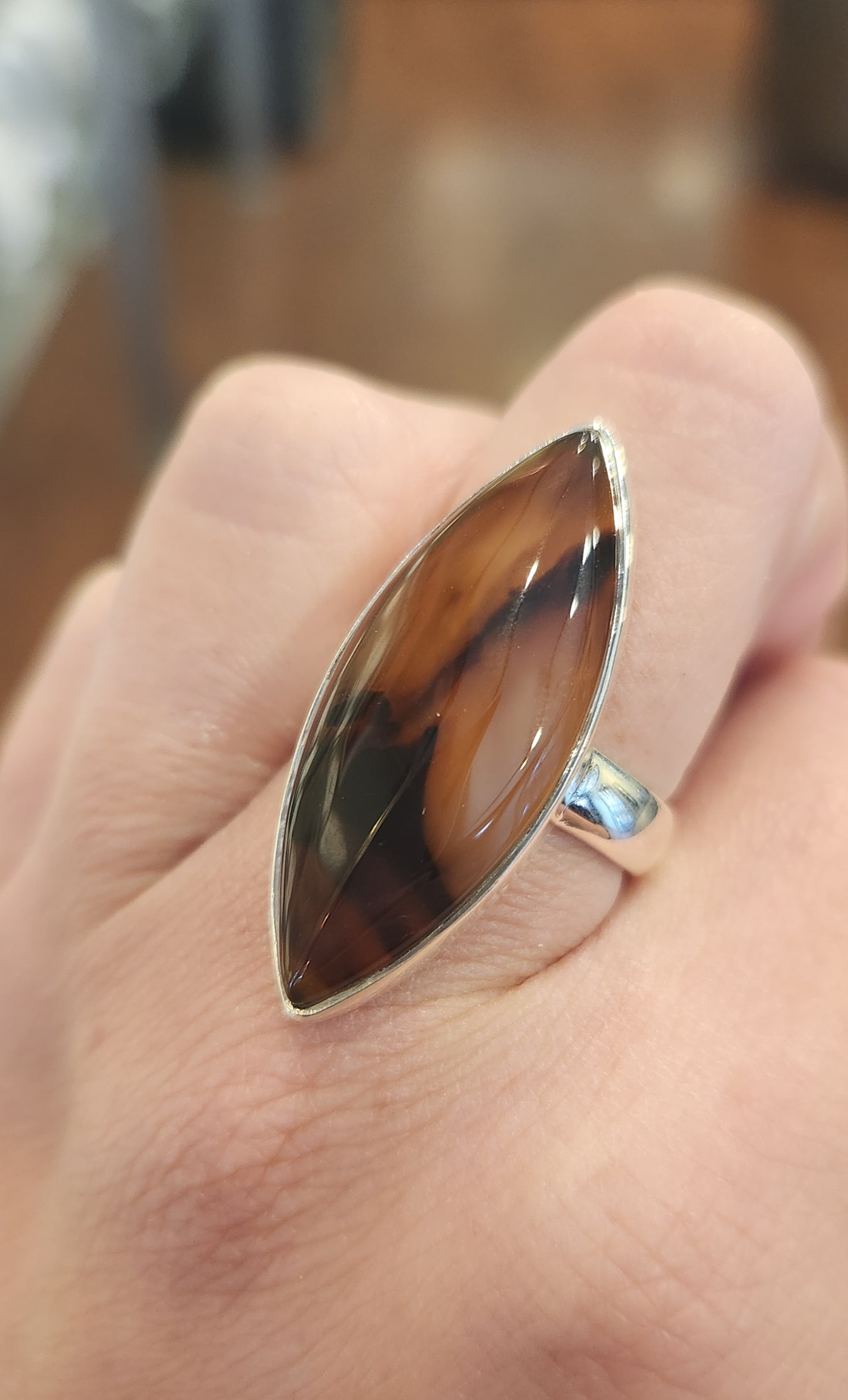 Sterling silver marquis-shaped montana agate ring