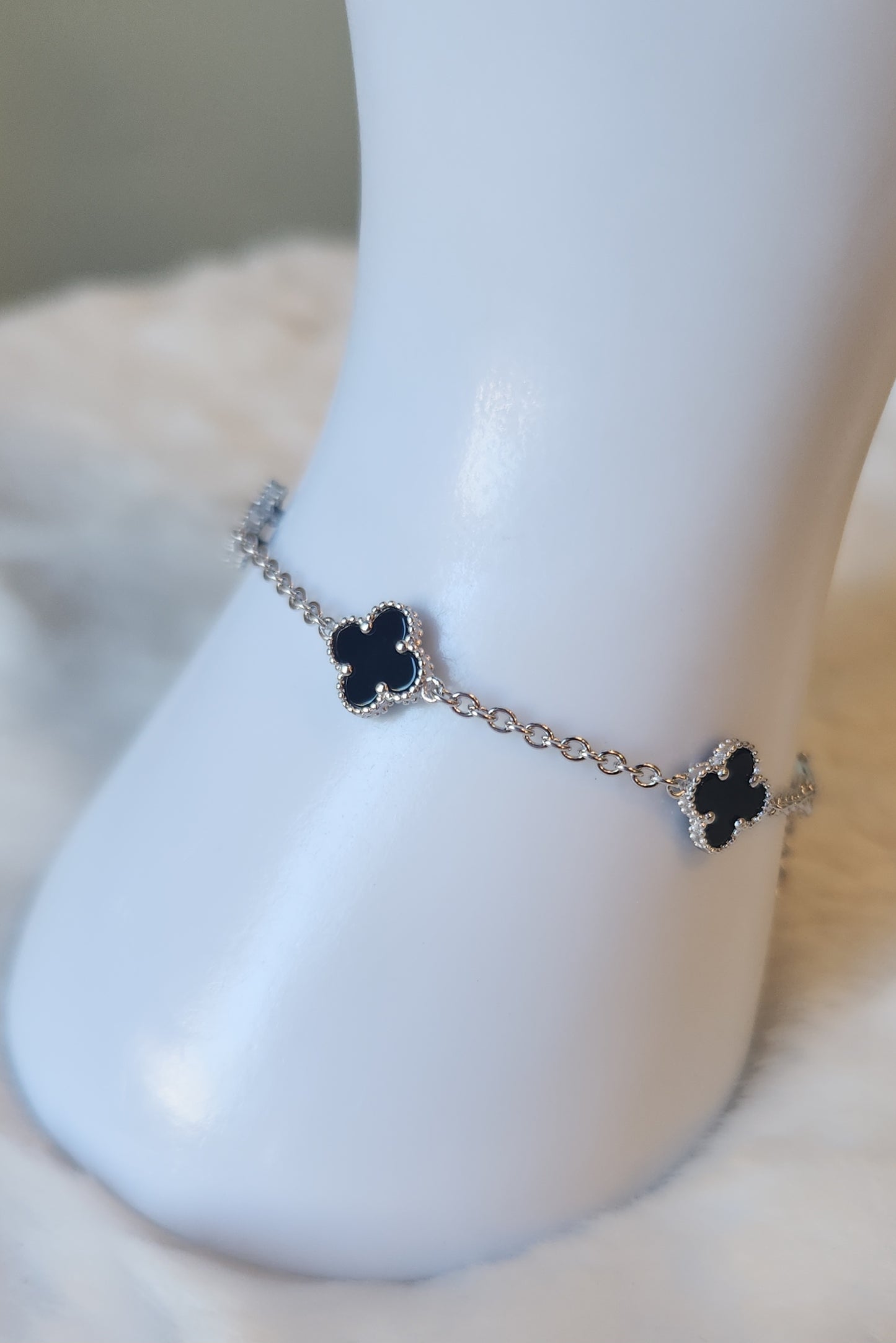 Sterling silver black clover station bracelet