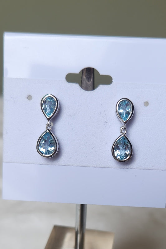 Sterling silver blue topaz dangle post earrings