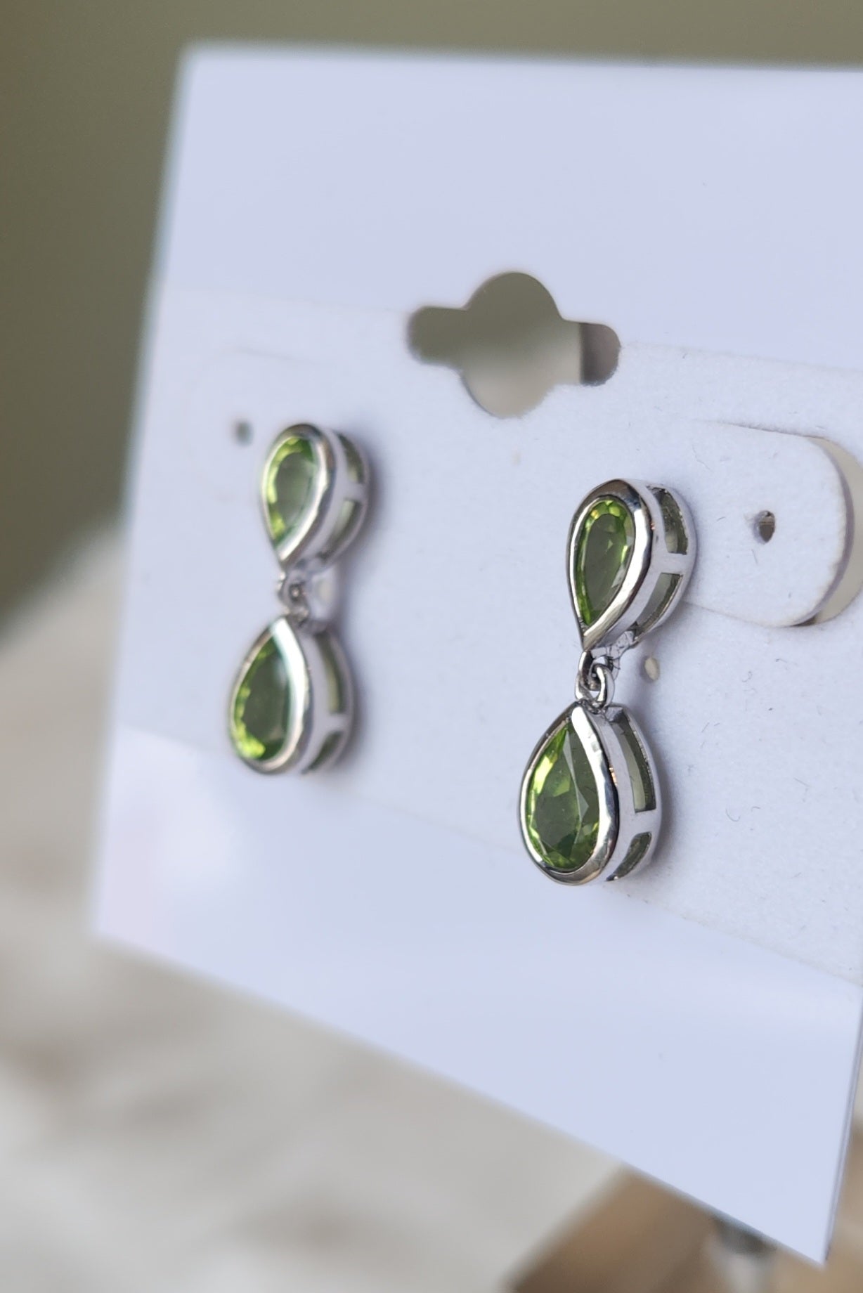 Sterling silver peridot dangle post earrings