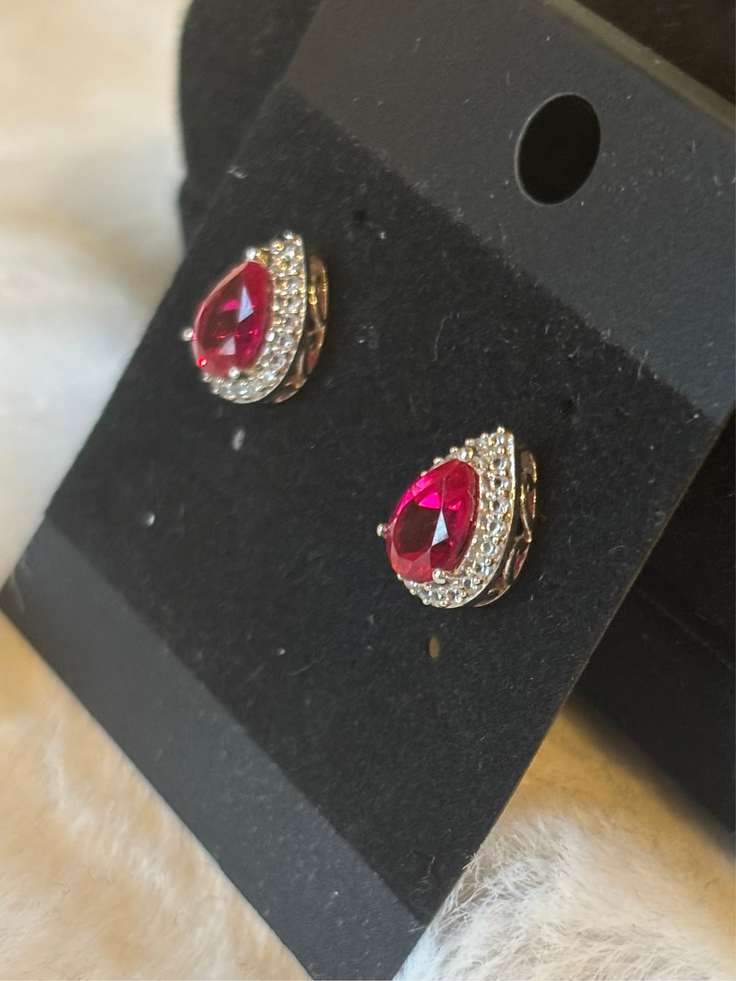 Sterling silver pear-shaped ruby halo earring studs