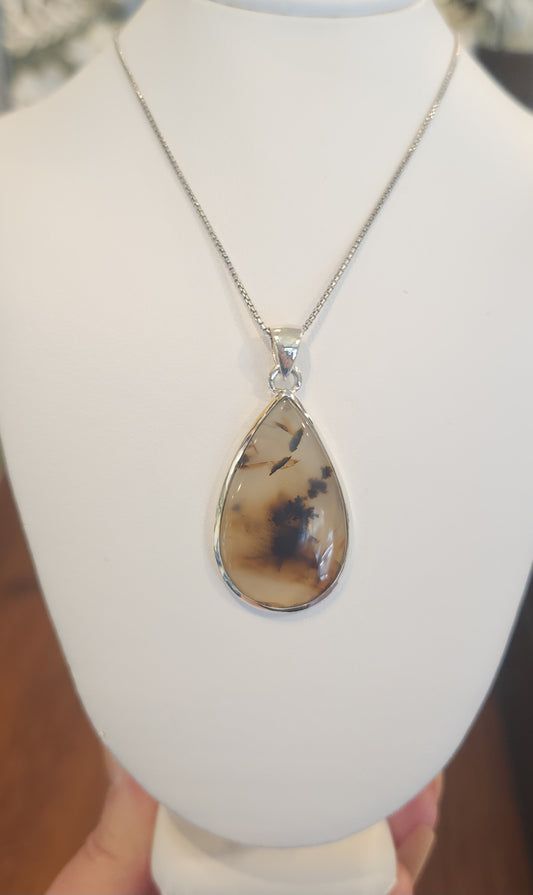 Sterling silver pear shaped Montana agate pendant