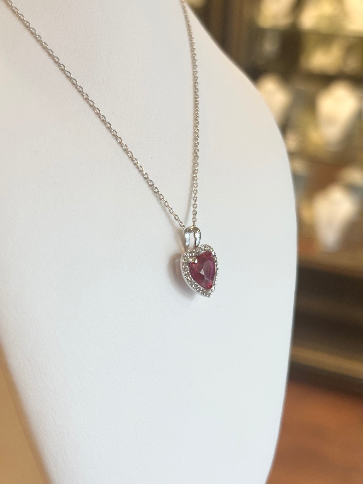 Sterling silver ruby heart halo pendant