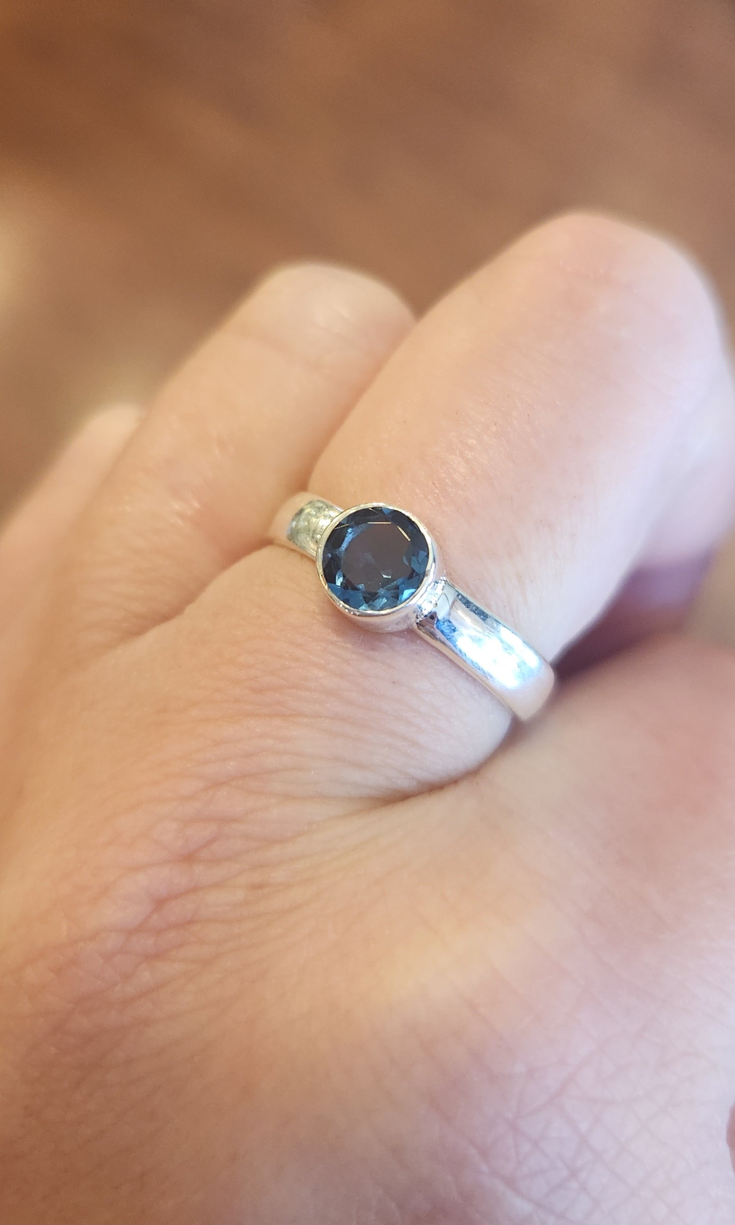 Sterling silver round london blue topaz ring