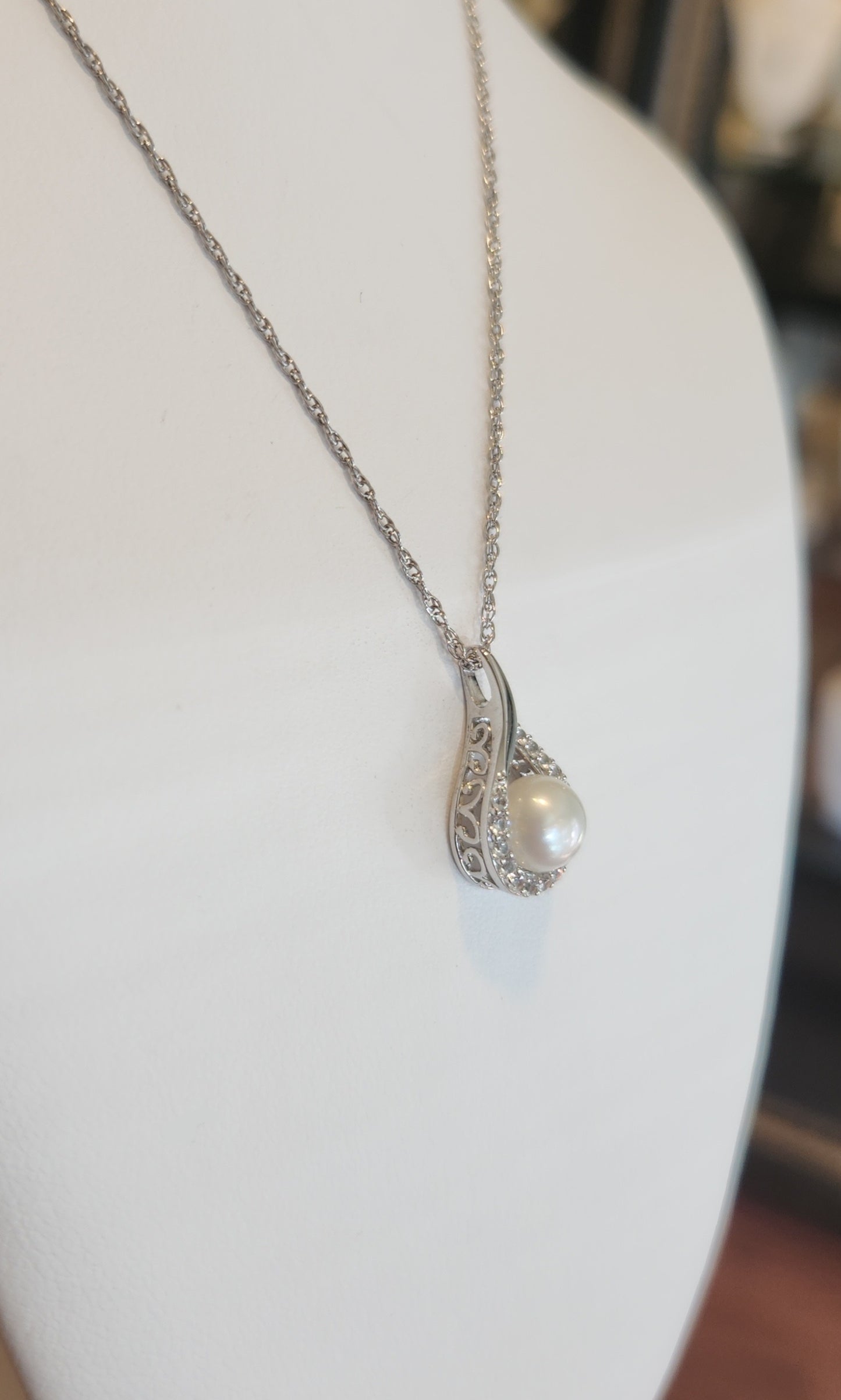 Sterling silver pearl and white sapphire pendant