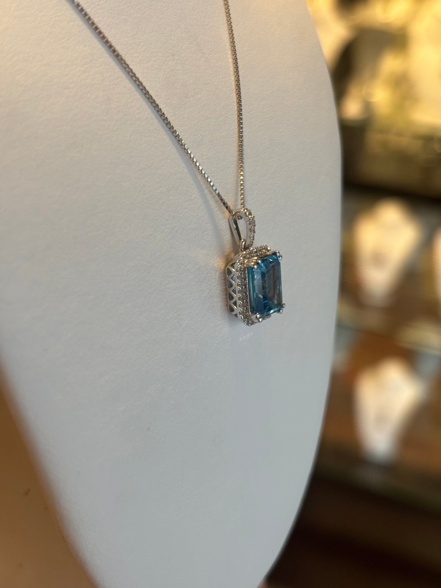 Sterling silver rectangle blue topaz pendant with diamonds