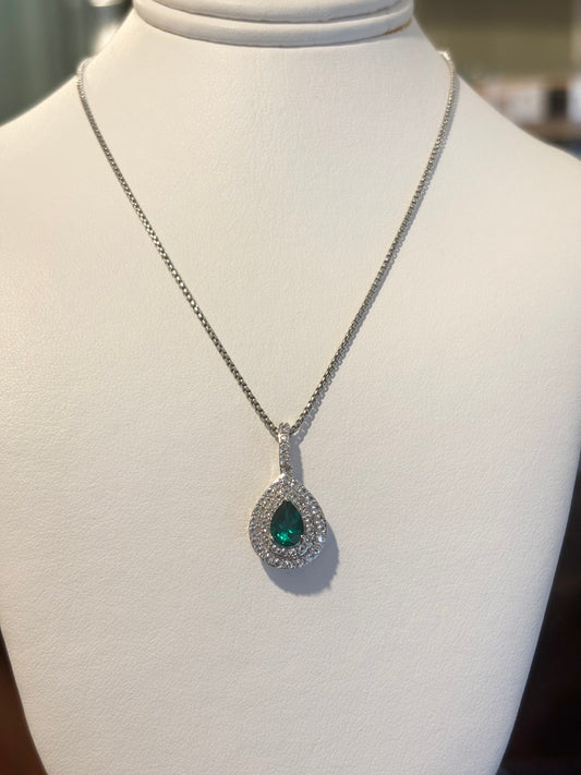 Sterling silver emerald double halo pendant