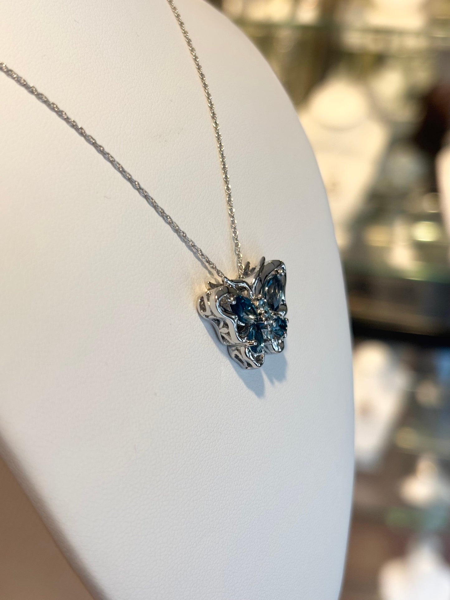 Sterling silver blue topaz butterfly pendant