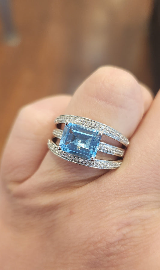 Sterling silver triple band blue topaz ring with diamonds