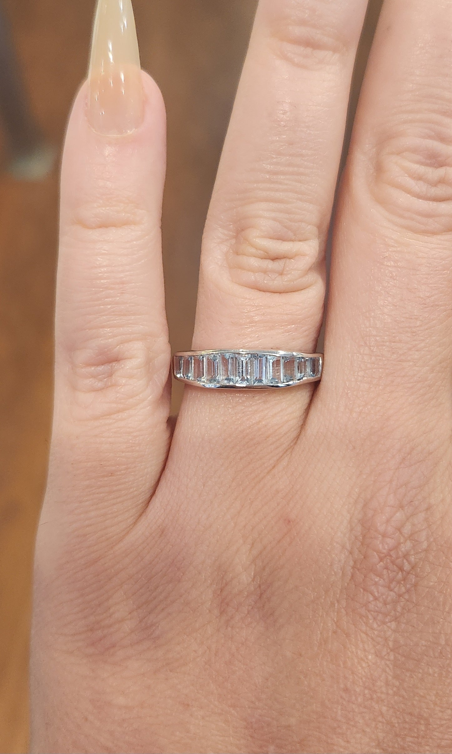 Sterling silver blue topaz channel set ring