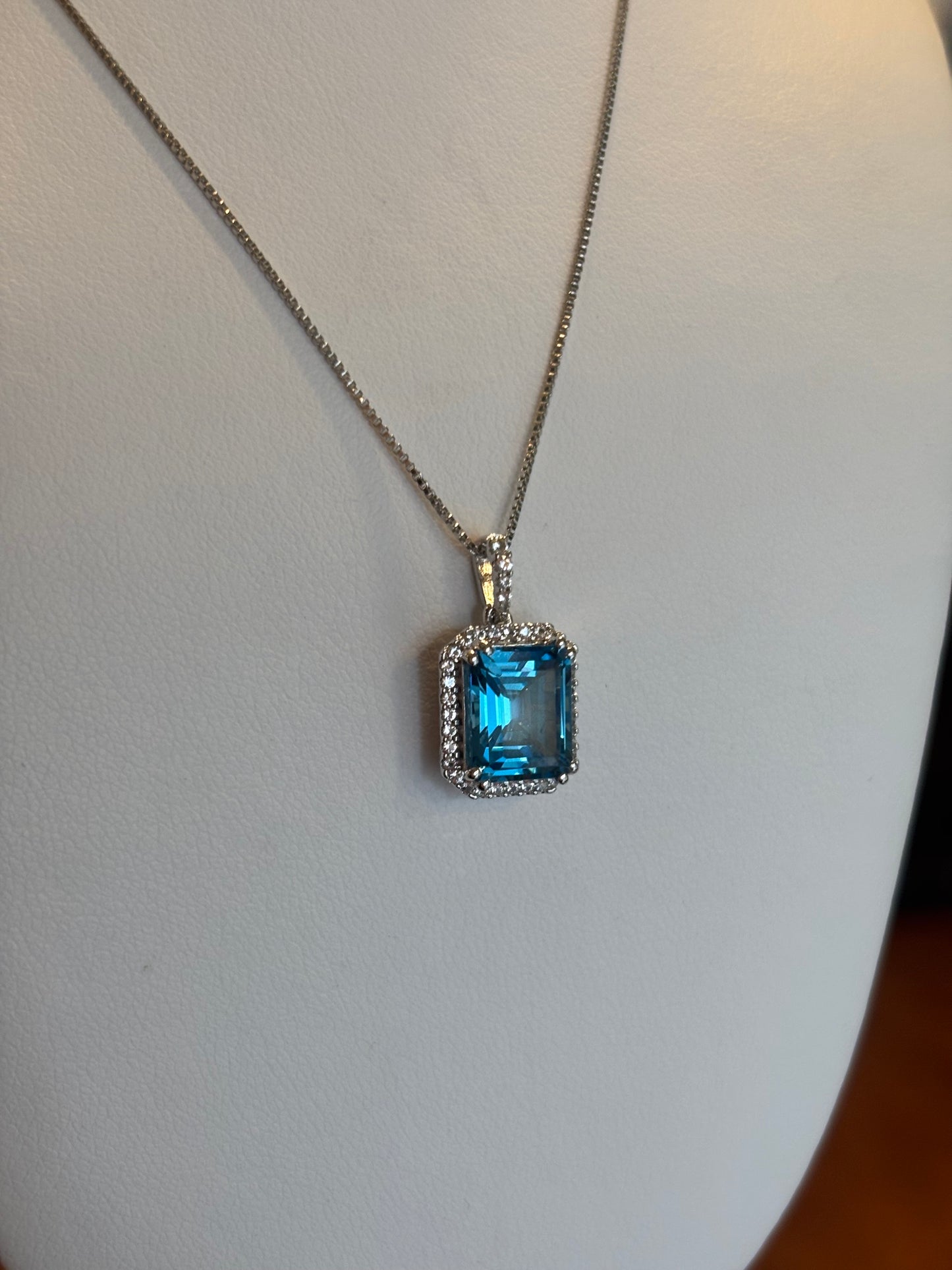 Sterling silver rectangle blue topaz pendant with diamonds