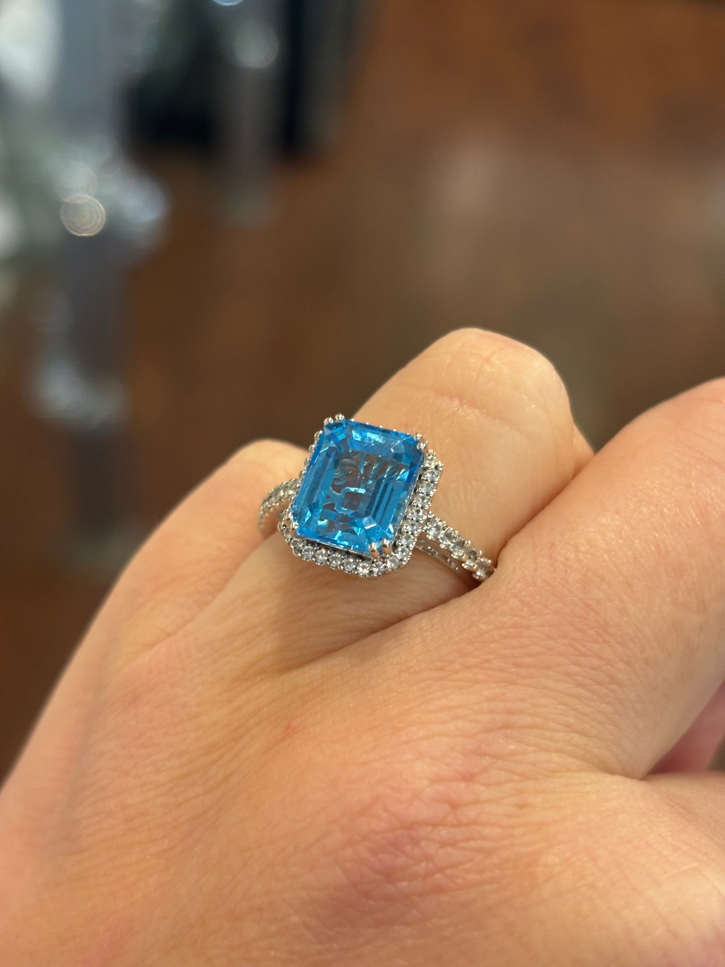 Sterling silver rectangle shaped blue topaz ring with diamonds