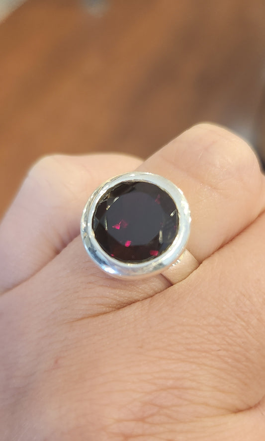 Sterling silver round faceted garnet ring