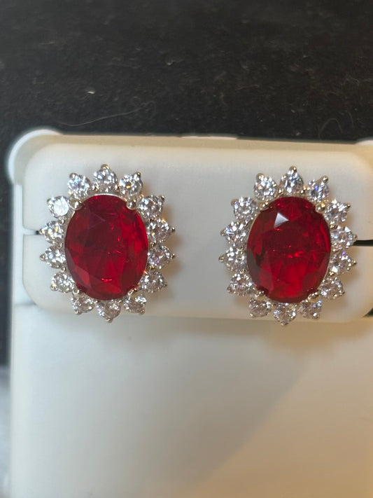 Sterling silver oval ruby halo stud earrings