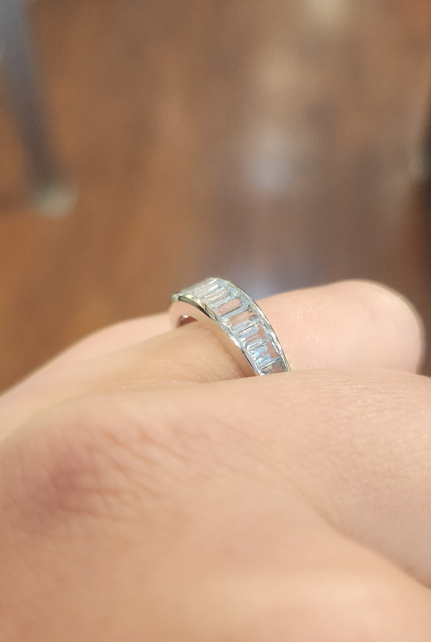 Sterling silver blue topaz channel set ring