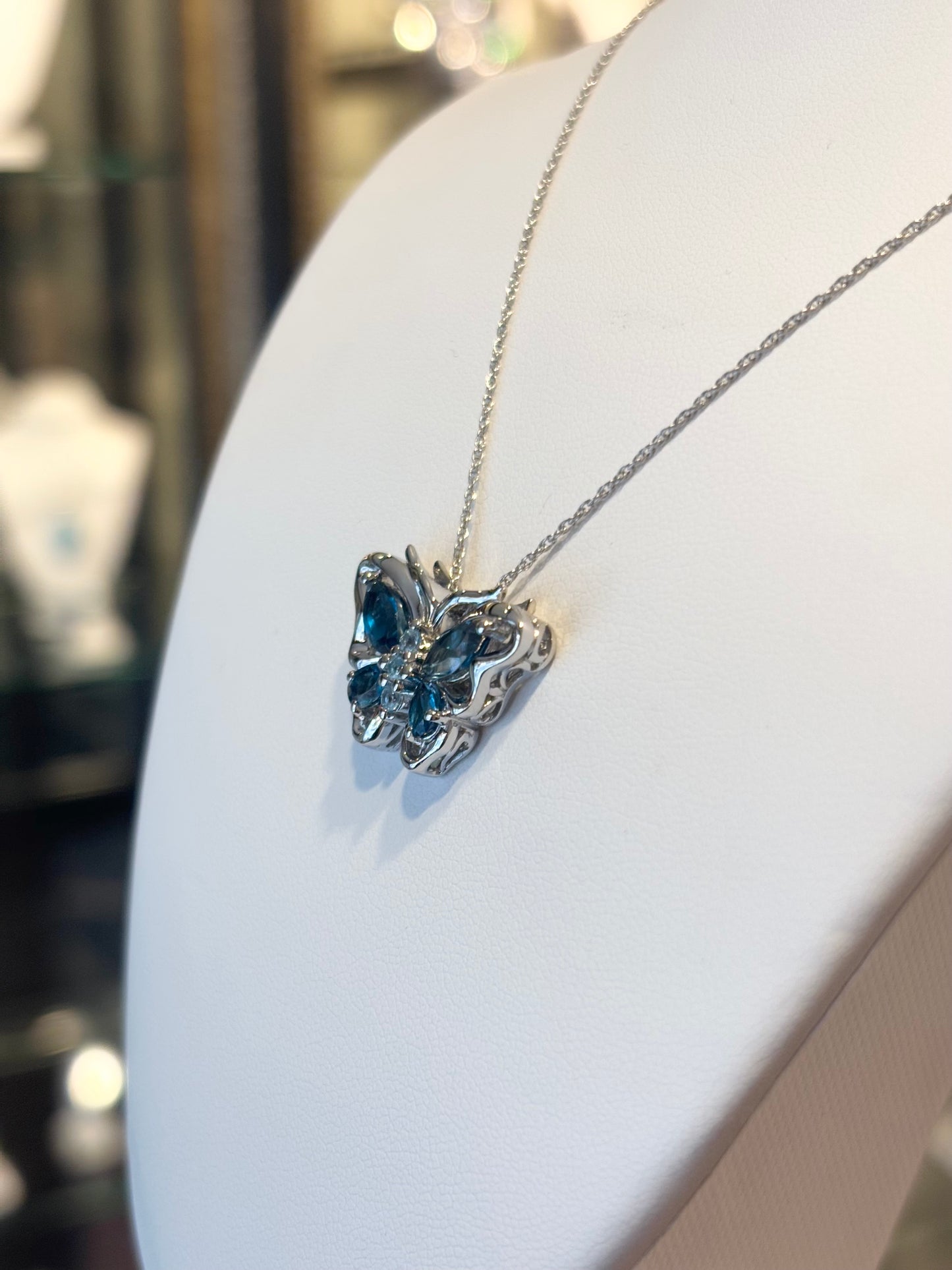 Sterling silver blue topaz butterfly pendant