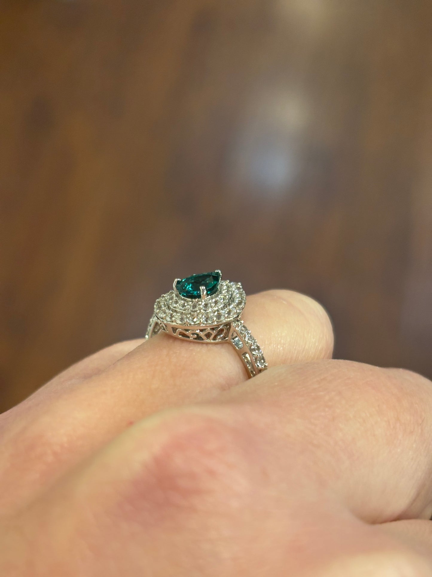 Sterling silver pear-shaped emerald ring