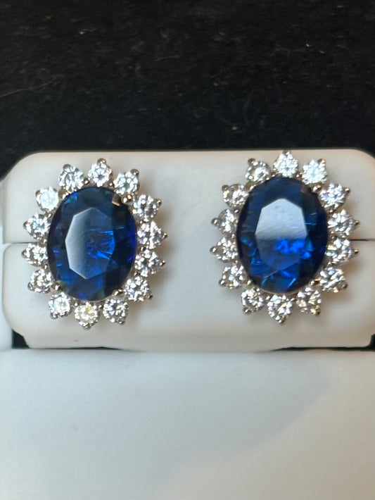 Sterling silver oval blue sapphire halo stud earrings