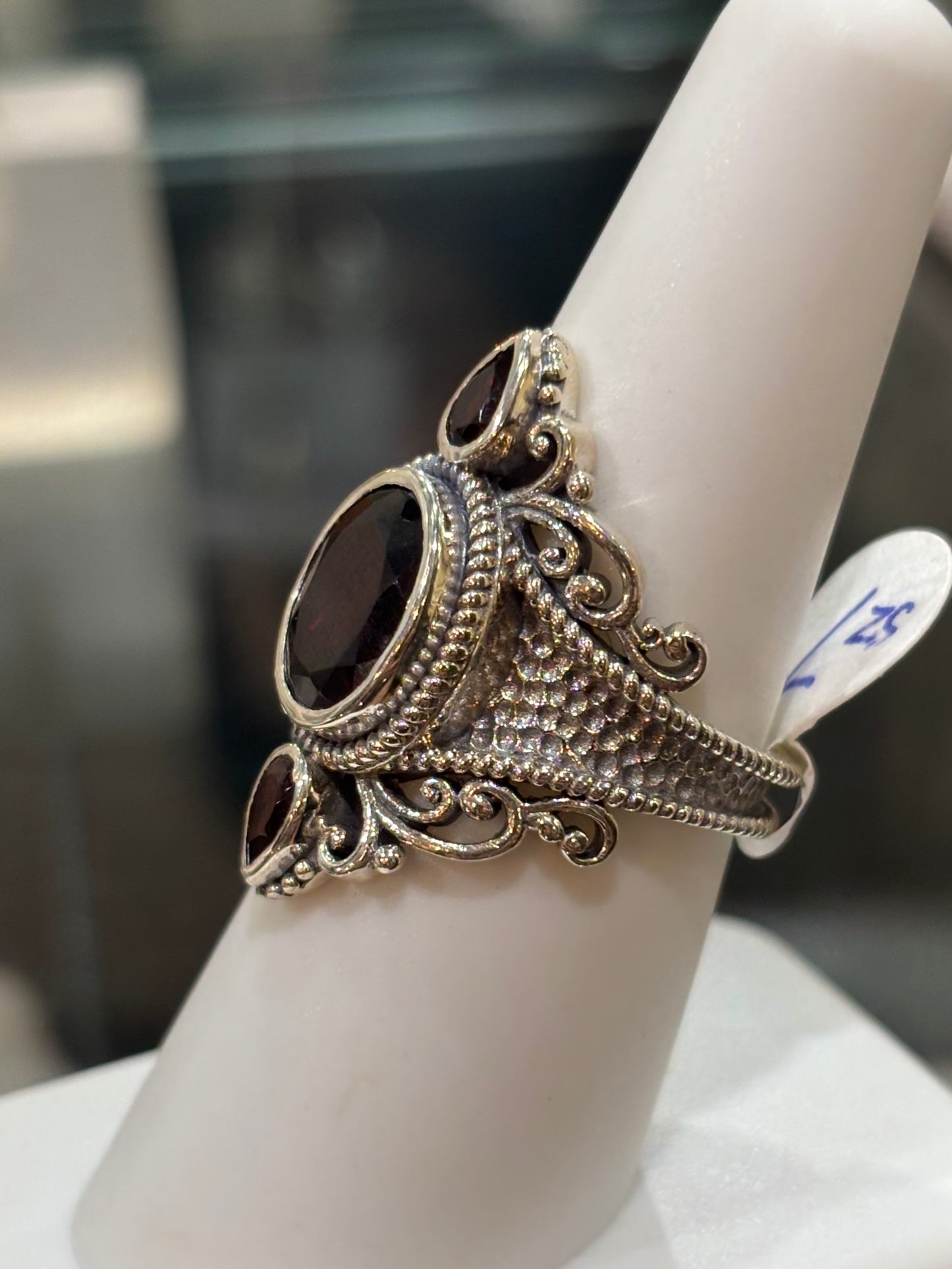 Sterling silver three stone garnet statement ring