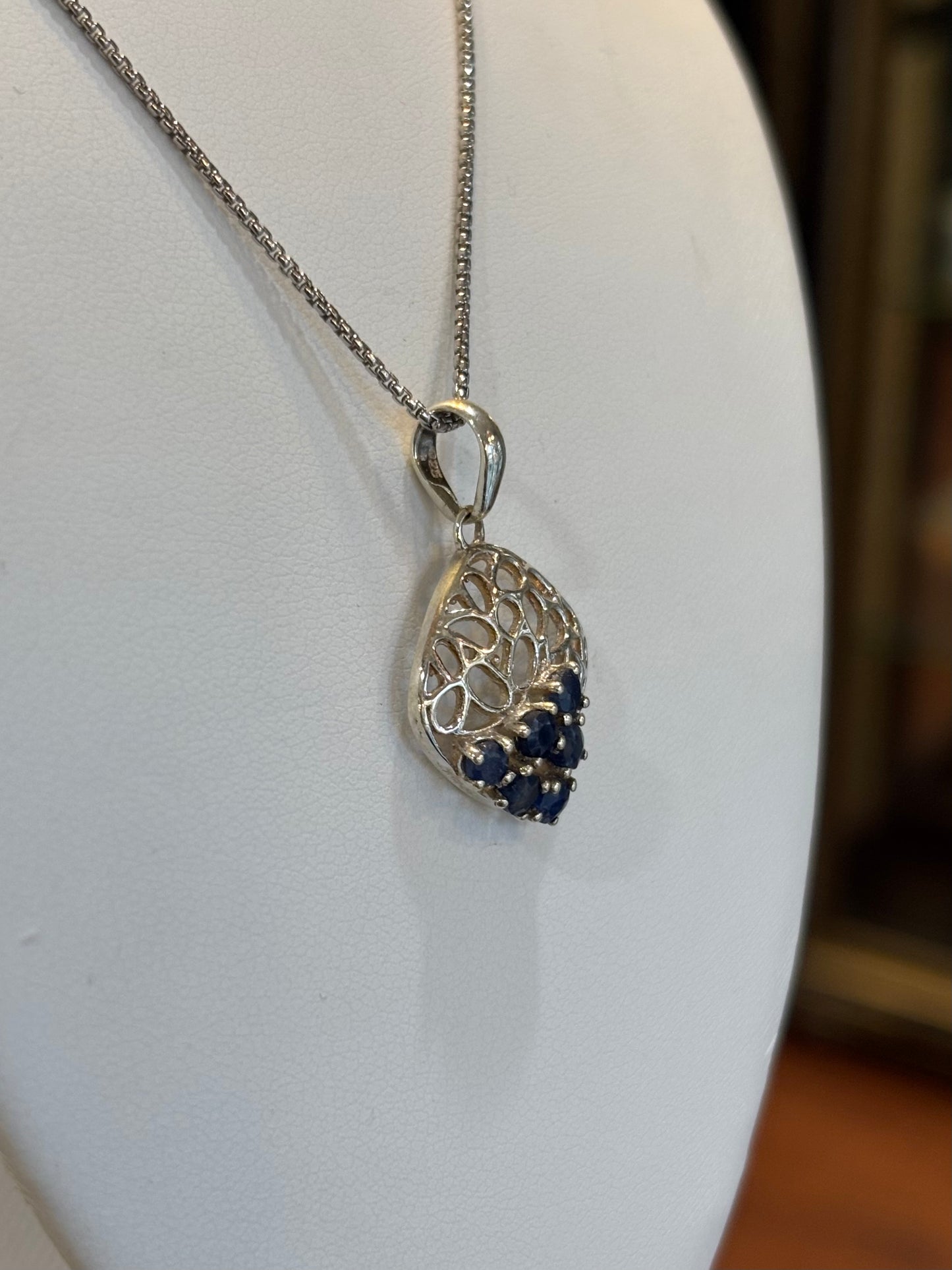 Sterling silver multi-stone blue sapphire pendant