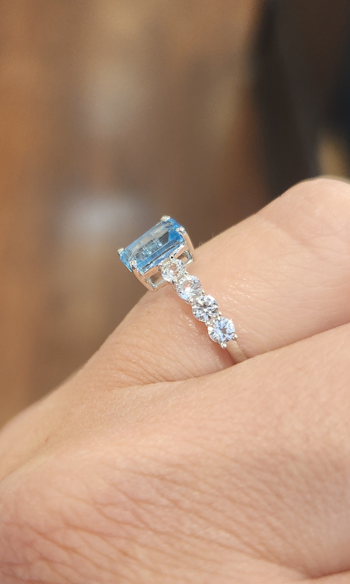 Sterling silver blue and white topaz ring