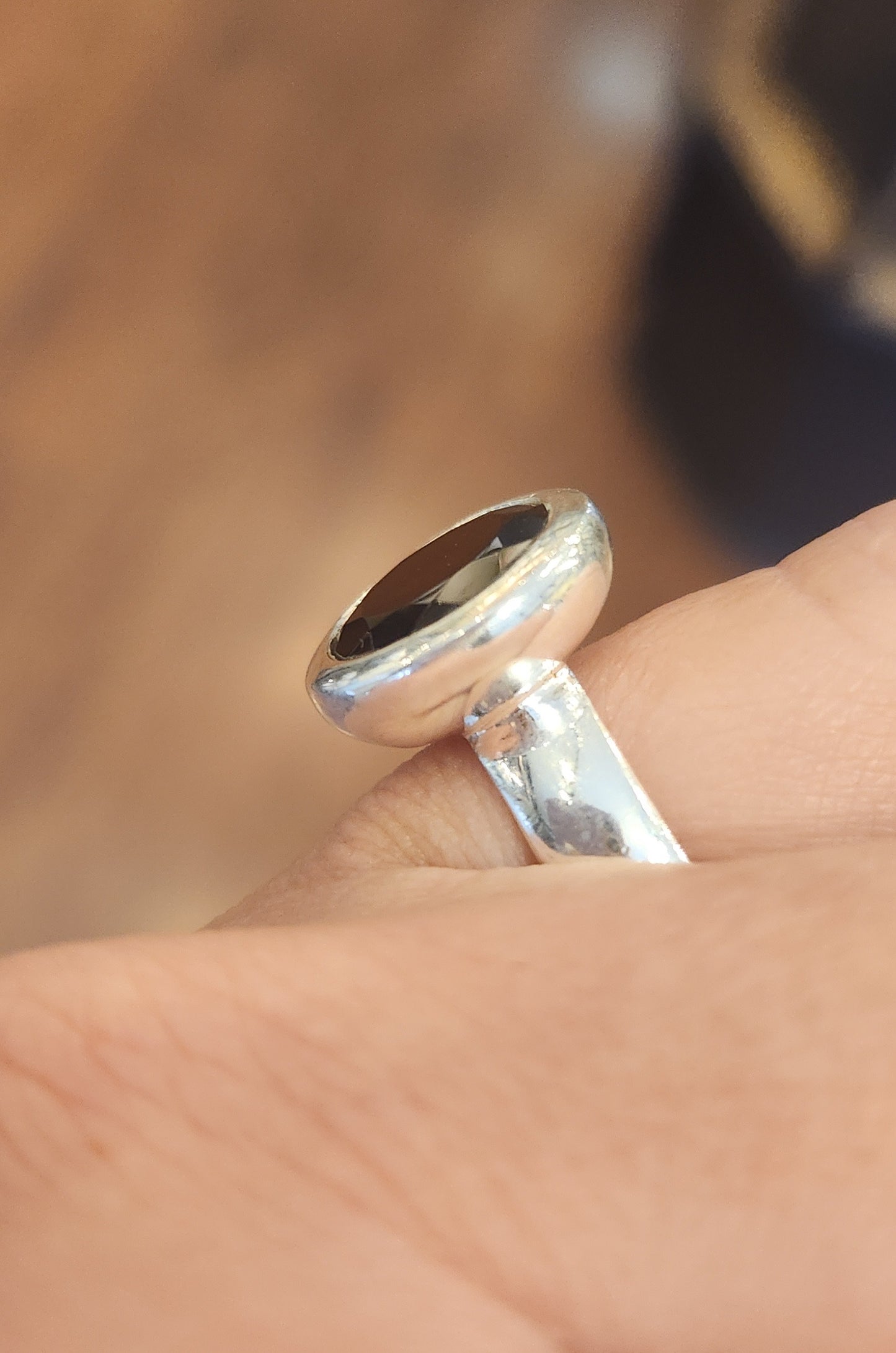 Sterling silver round faceted garnet ring