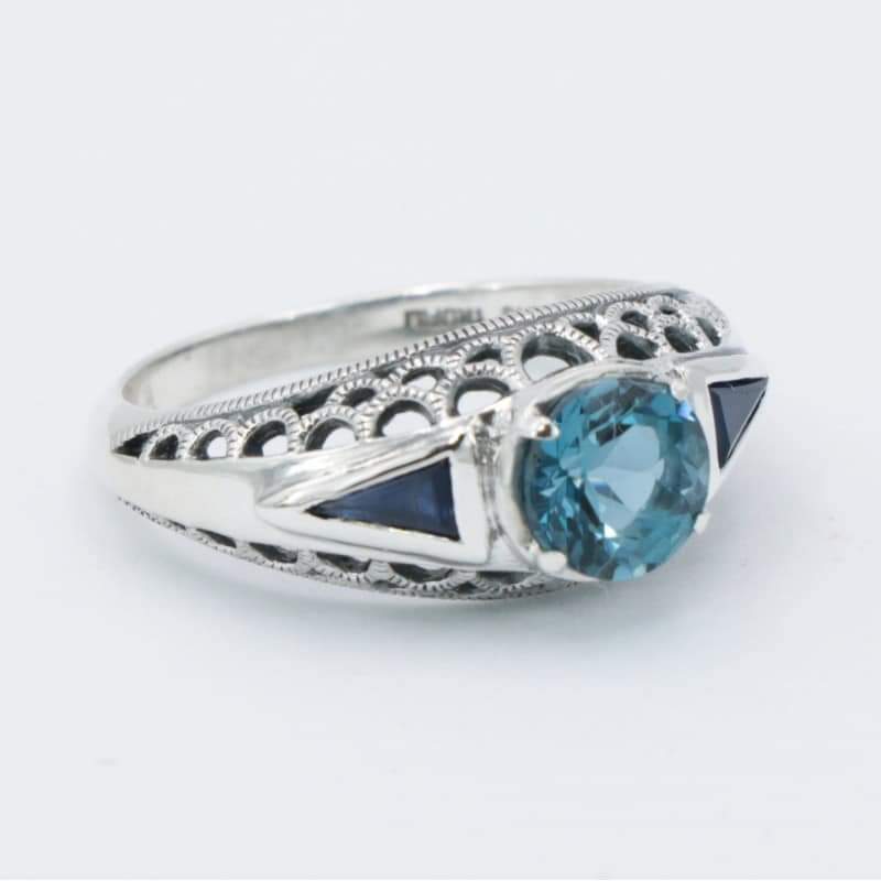 Sterling silver blue topaz & sapphire filigree ring