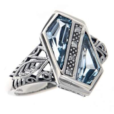 Sterling silver two-stone blue topaz ring with diamonds