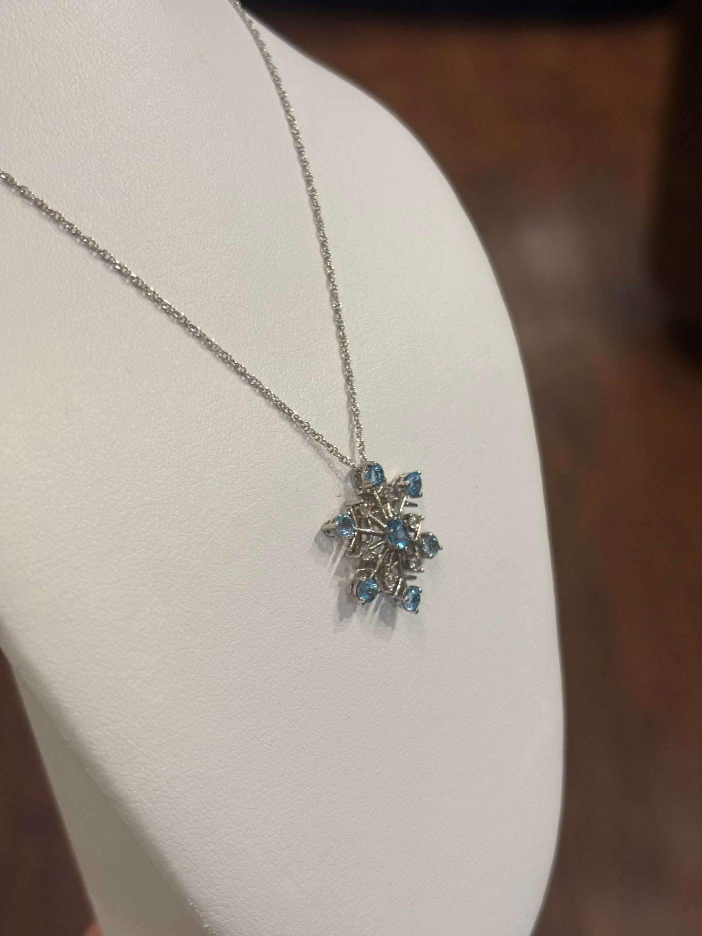 Sterling silver blue topaz snowflake pendant