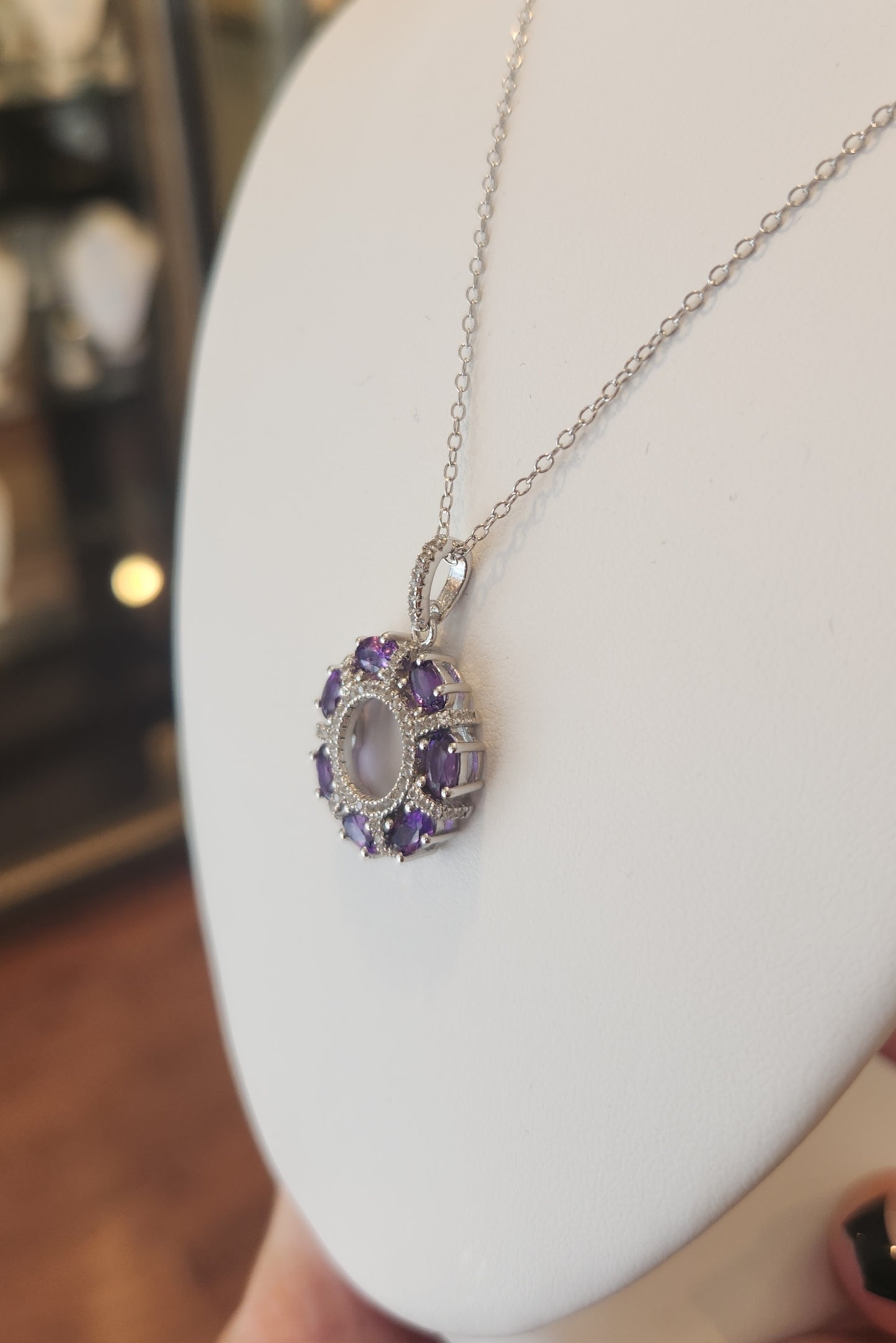 Sterling silver diamond and amethyst circle pendant