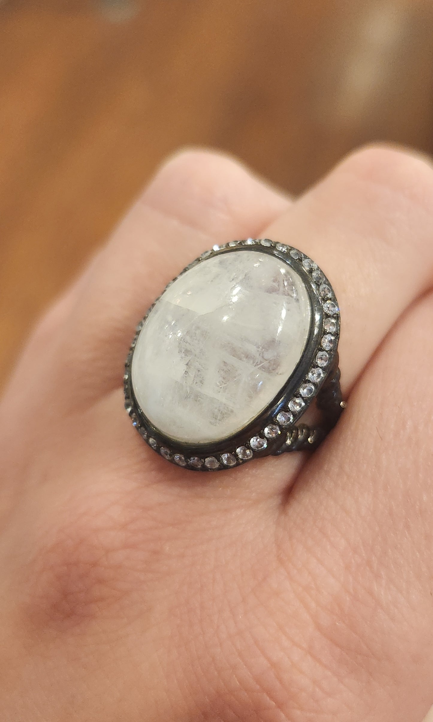 Sterling silver rainbow moonstone ring with white topaz