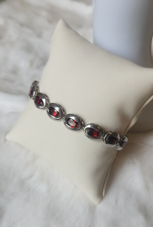 Sterling silver floating bezel garnet tennis bracelet