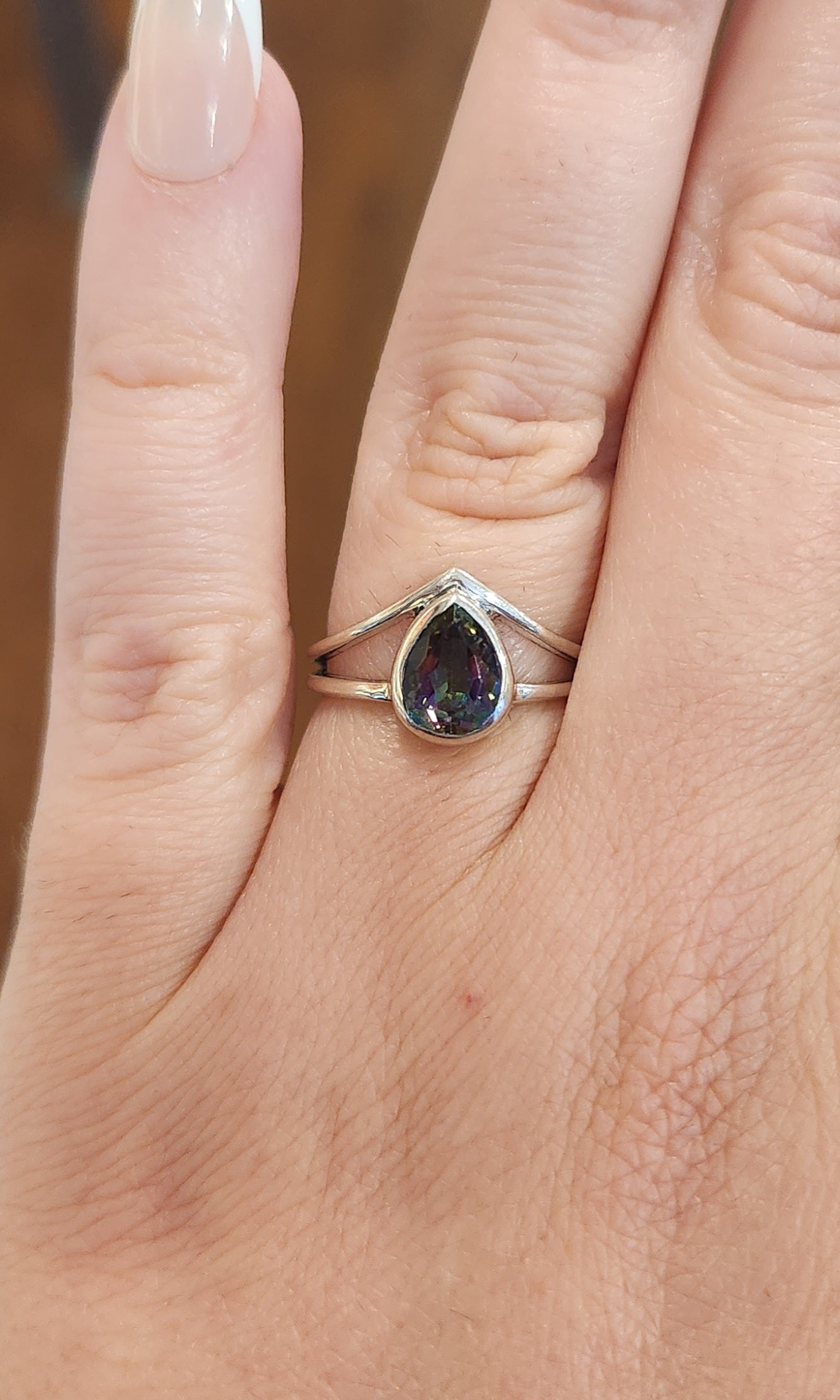 Sterling silver pear-shaped mystic topaz ring