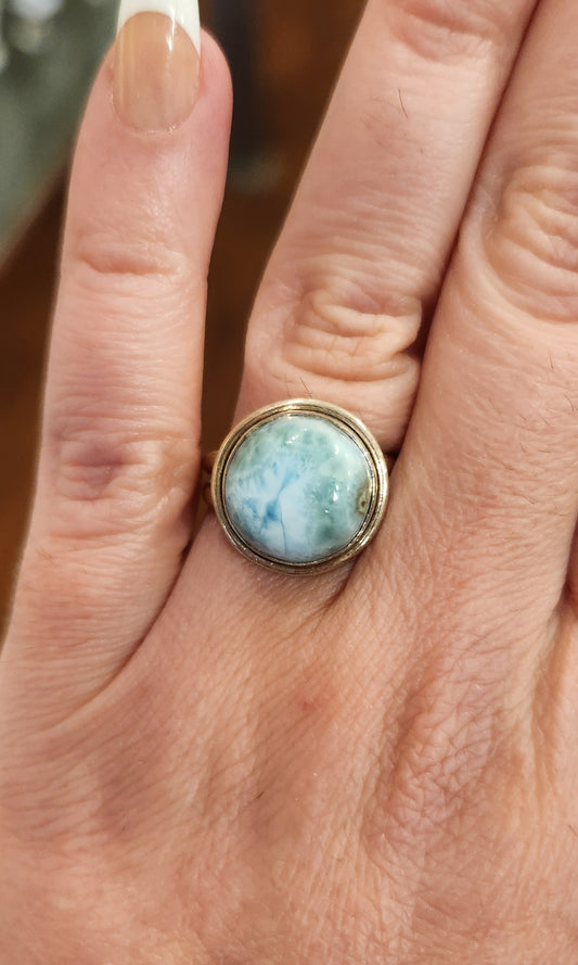 Sterling silver ring with round larimar cabochon