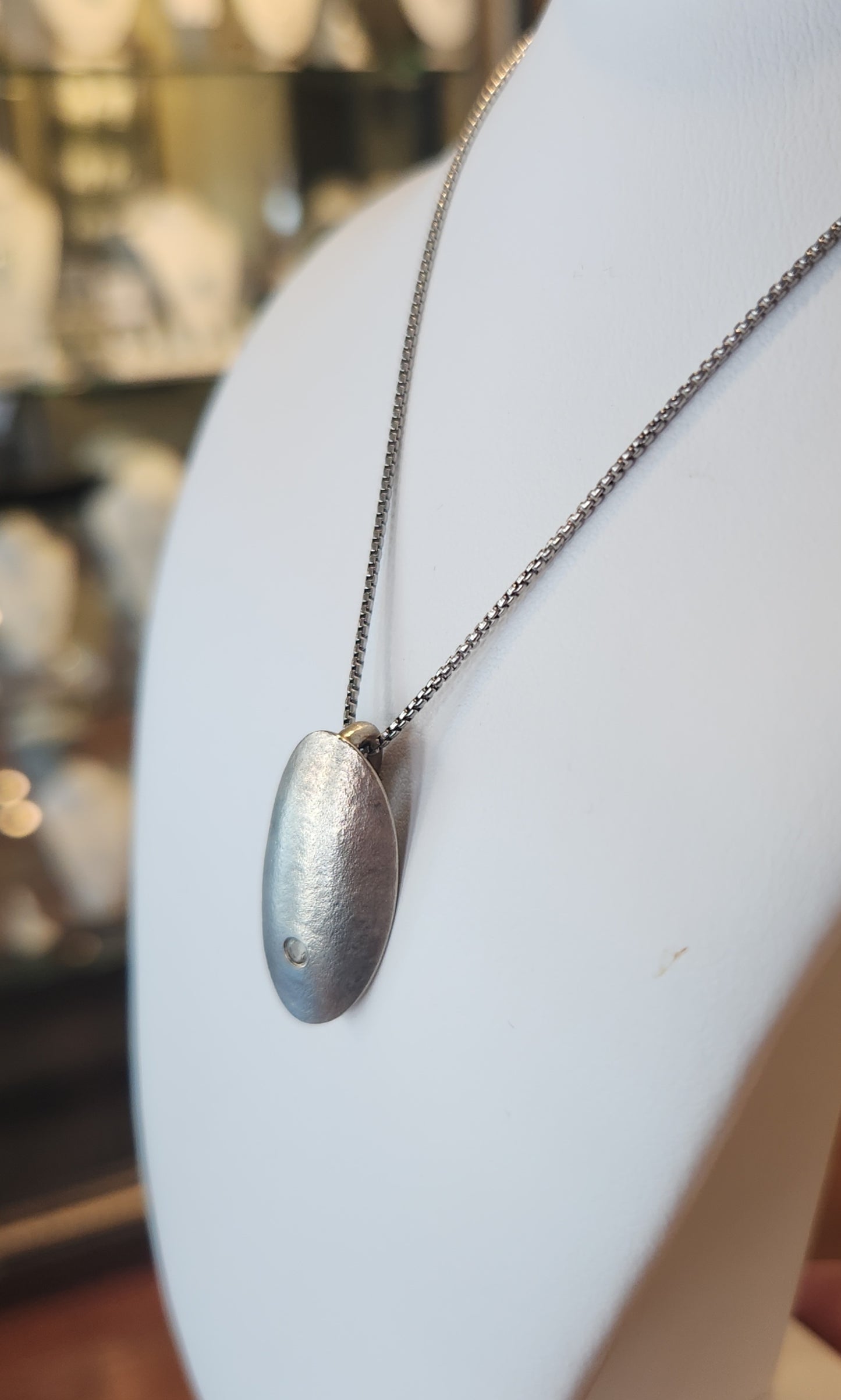 Sterling silver textured oval slide pendant with prasiolite