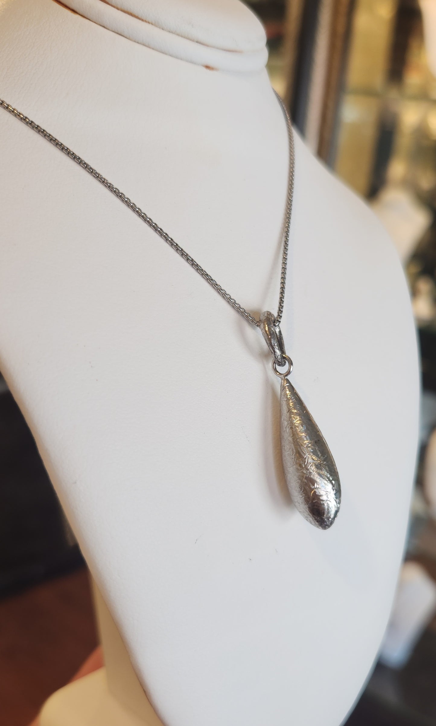 Sterling silver textured teardrop pendant