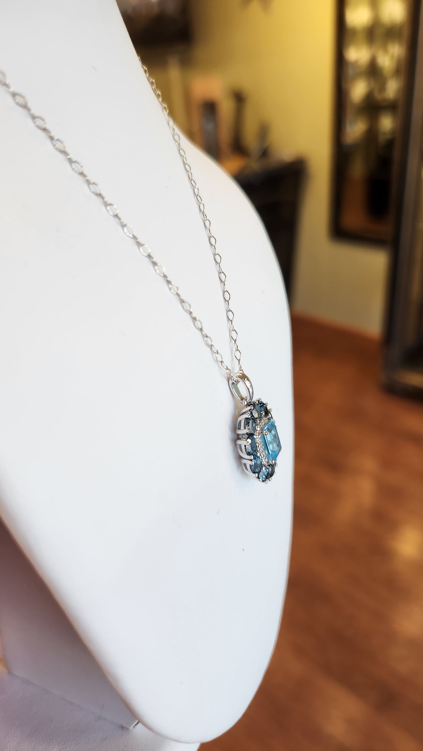 Sterling silver two-toned blue topaz pendant