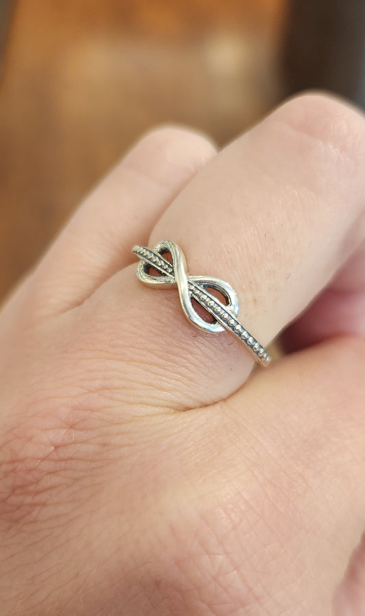 Sterling silver textured infinity ring