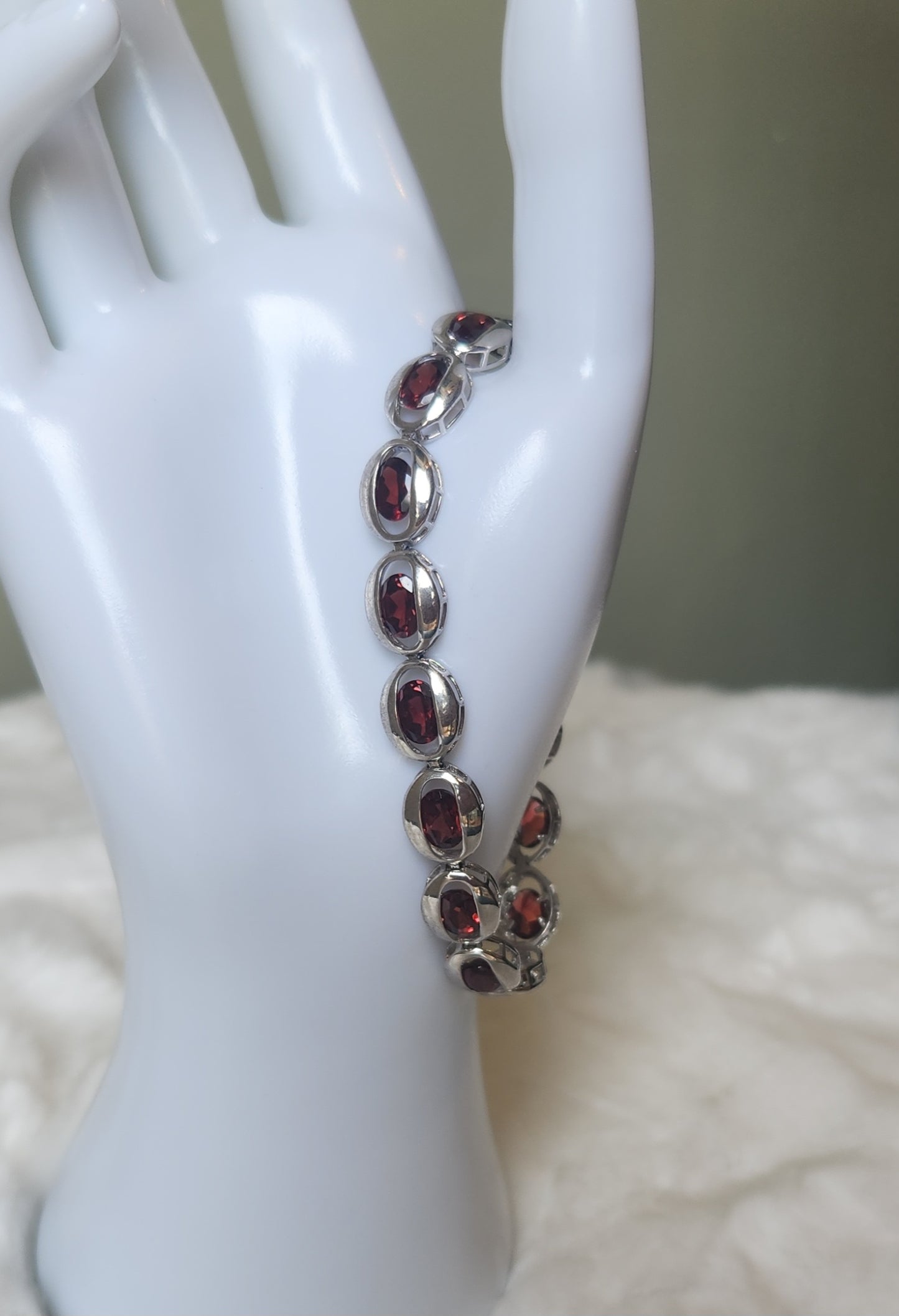 Sterling silver floating bezel garnet tennis bracelet