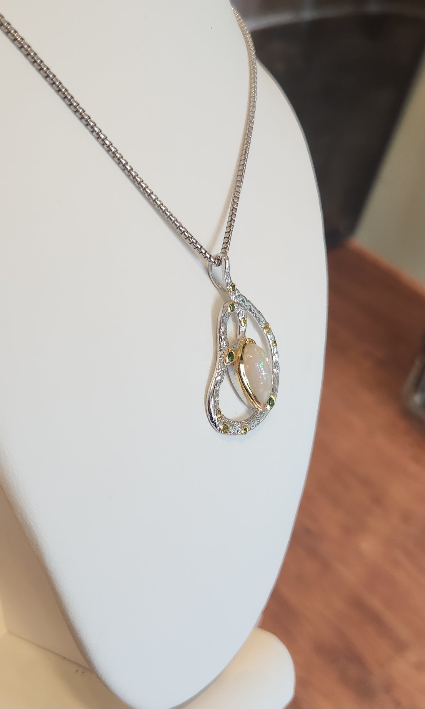 Sterling silver Ethiopian opal Swirl pendant with tourmaline