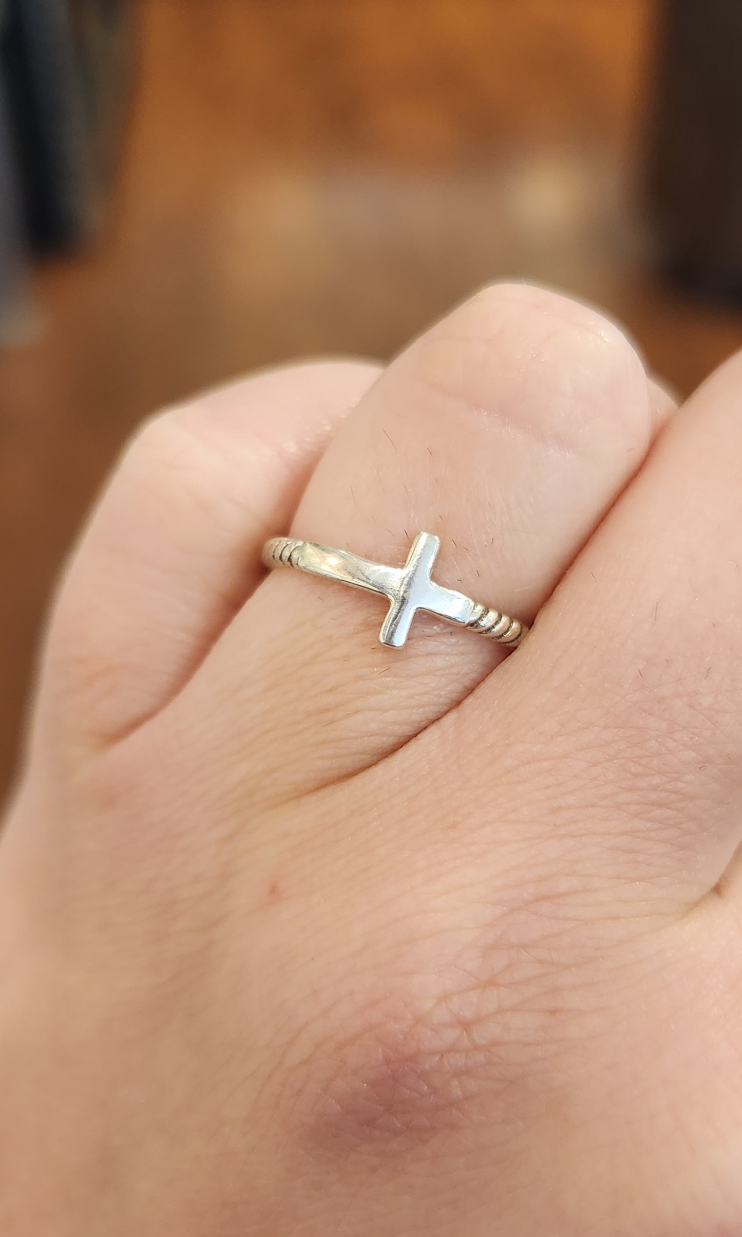 Sterling silver sideways cross ring with twisted band