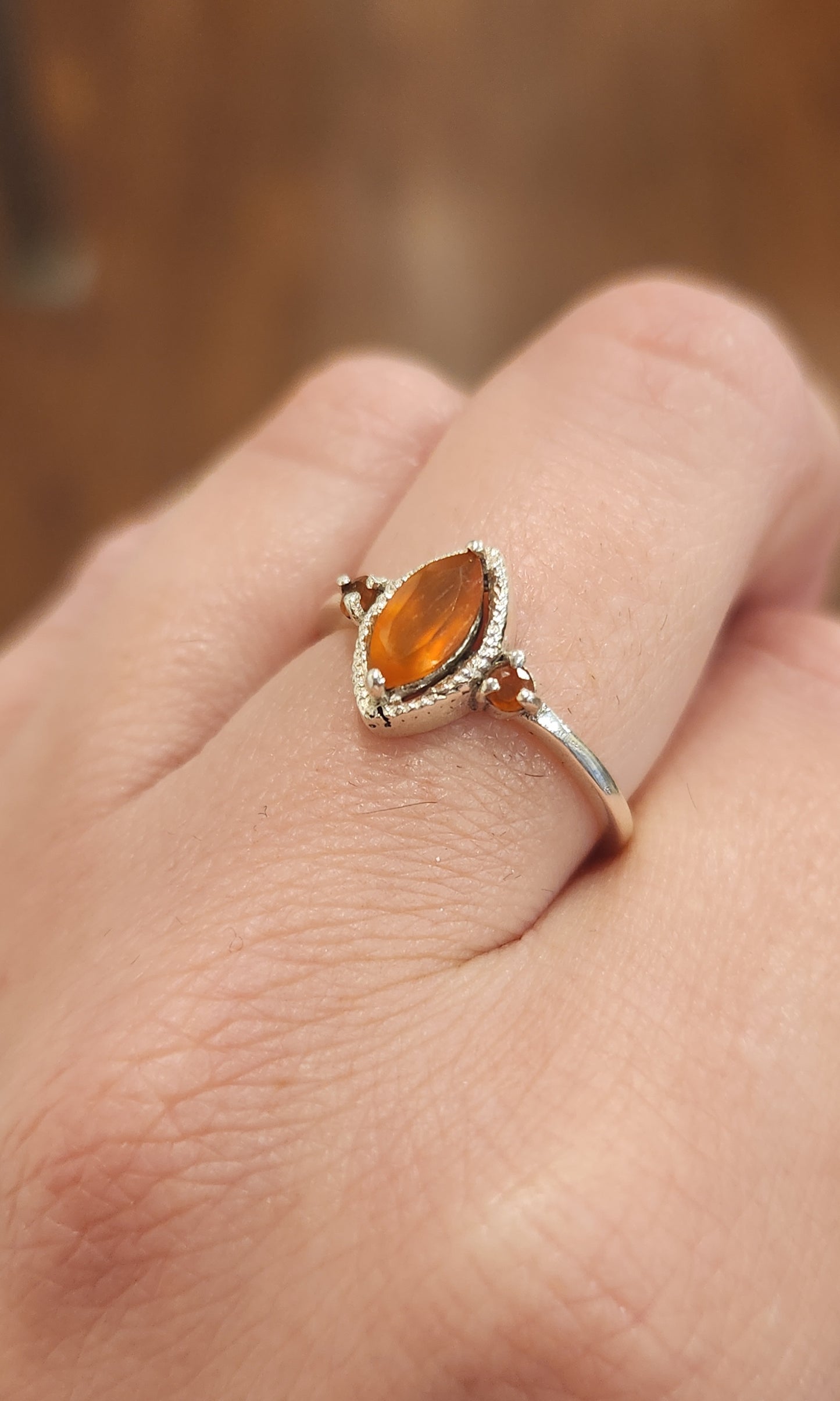 Sterling silver marquis-shaped fire opal ring