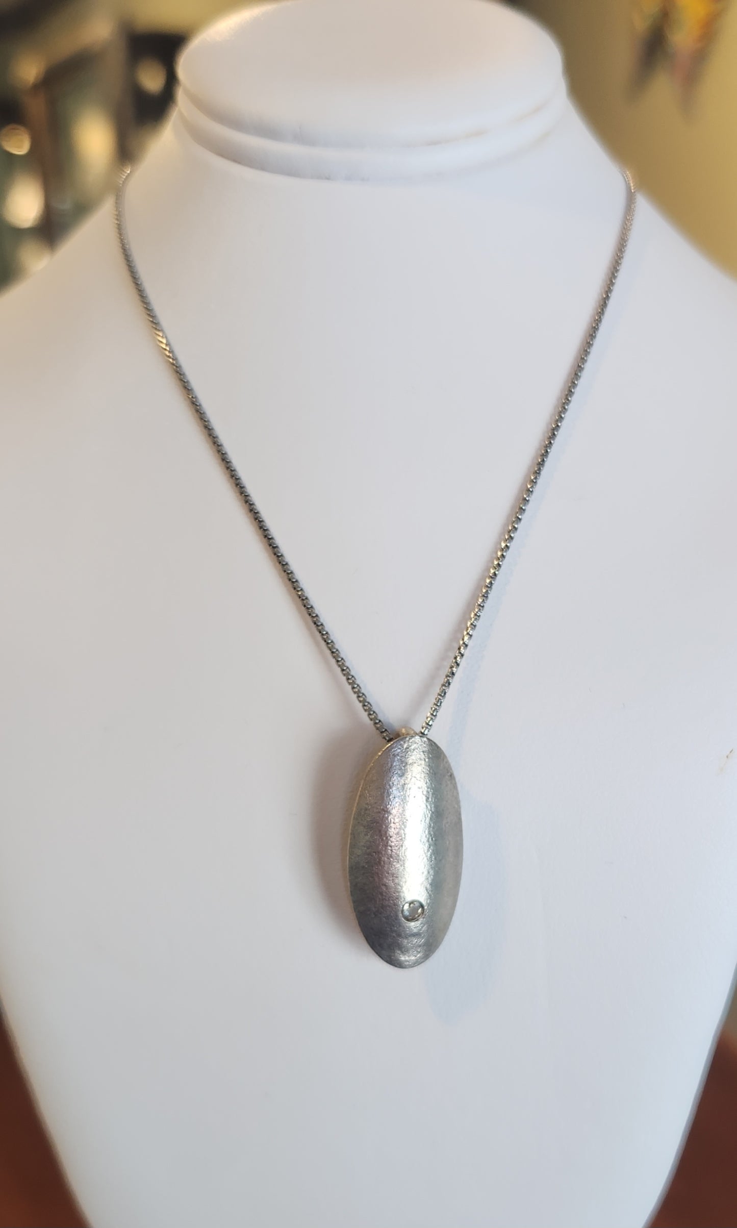 Sterling silver textured oval slide pendant with prasiolite