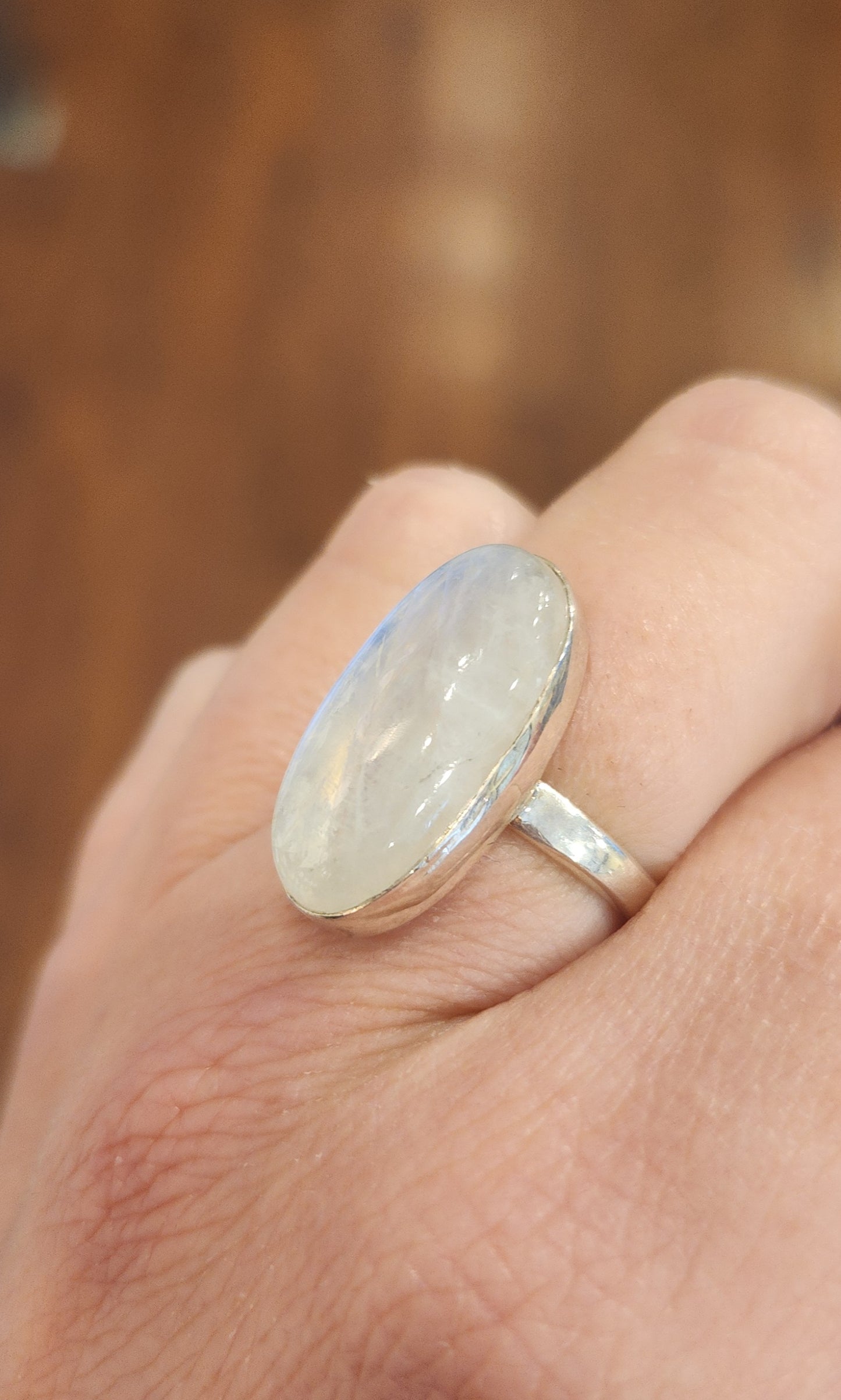 Sterling silver oval rainbow moonstone ring