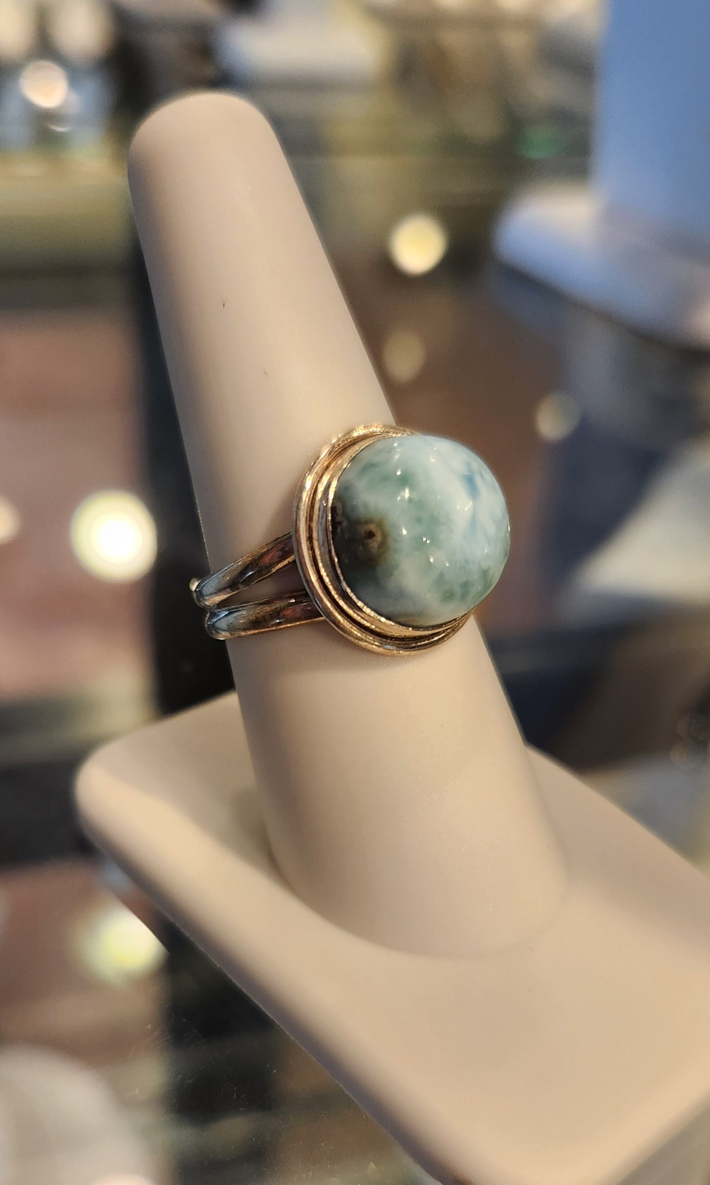 Sterling silver ring with round larimar cabochon