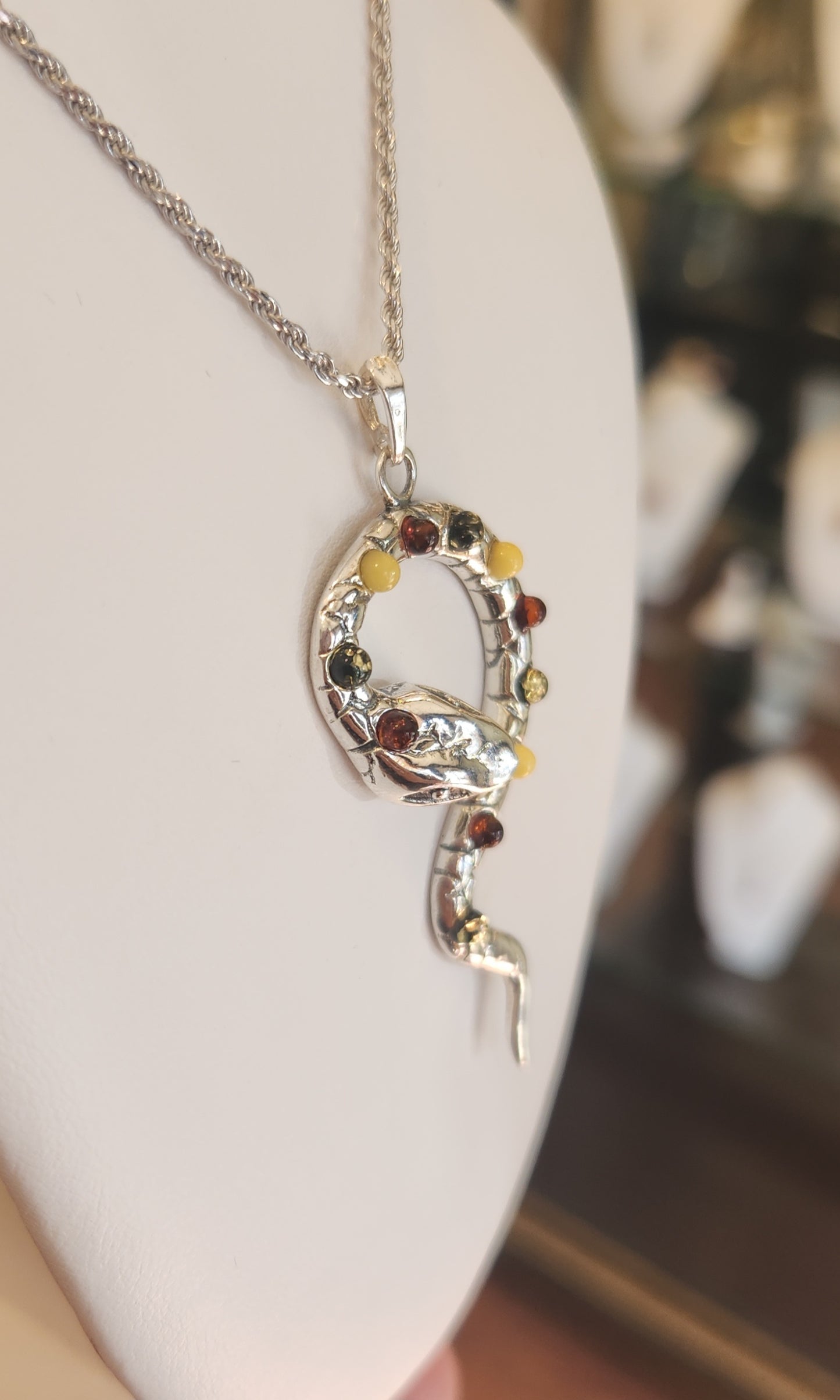 Sterling silver amber snake pendant