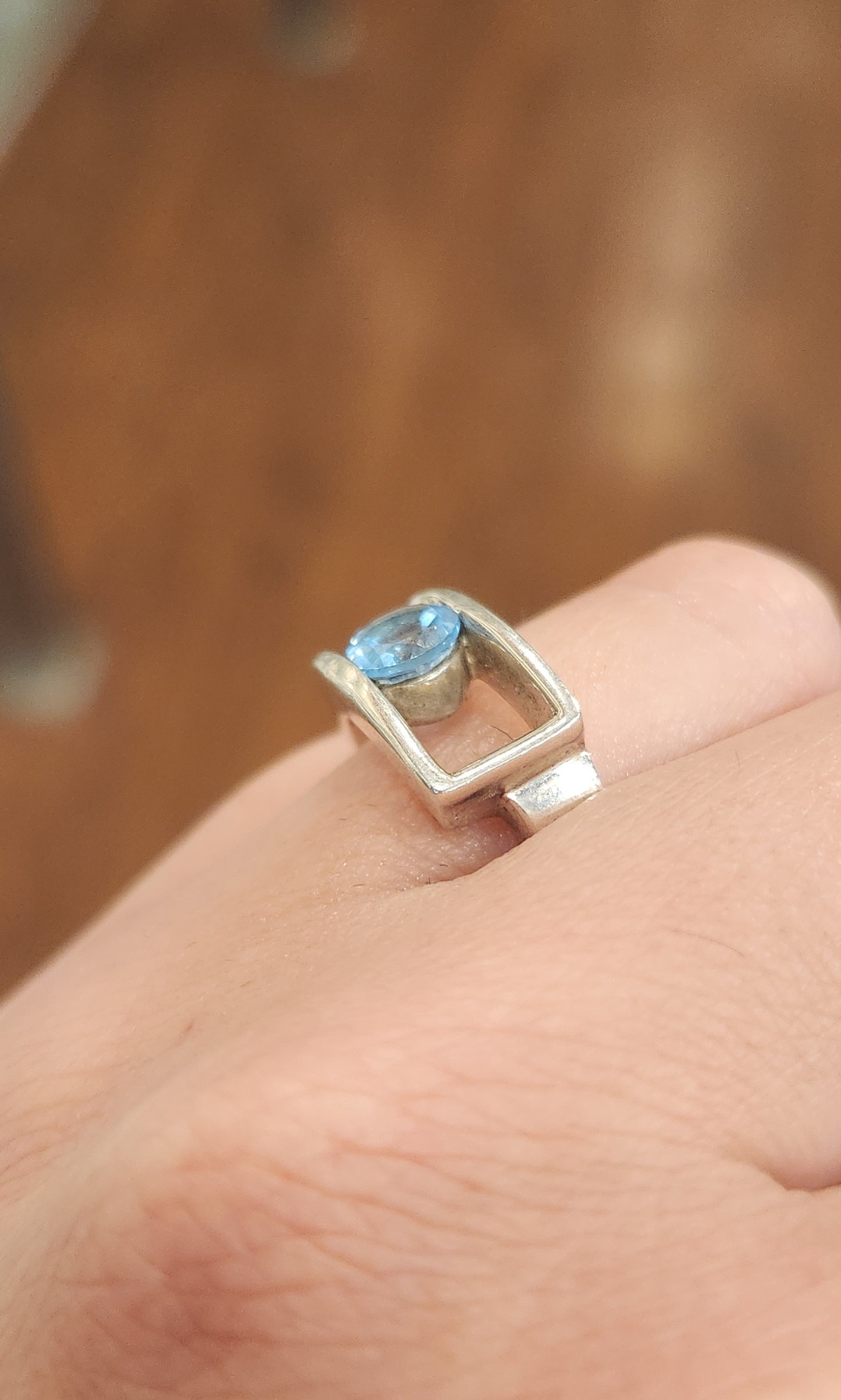 Sterling silver unique blue topaz ring