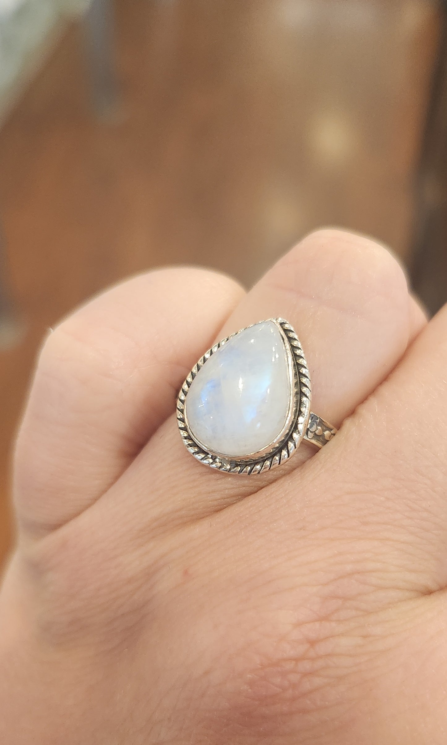 Sterling silver pear-shaped rainbow moonstone ring with unique band