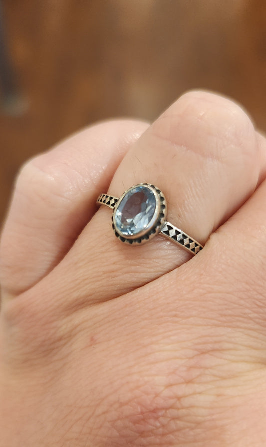 Sterling silver faceted oval blue topaz ring